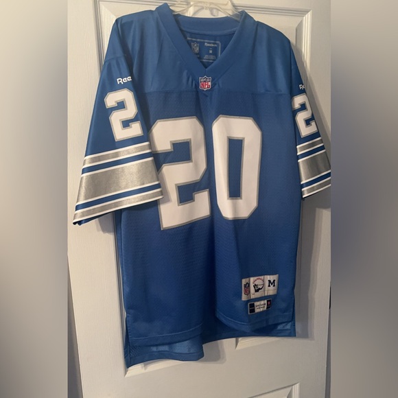 Reebok Other - This is a Detroit Lions Barry Sanders throwback jersey by Reebok stitched